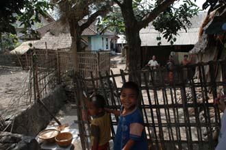 AMI Lombok Karangbayan traditional Sasak village panorama with laughing kids 3008x2000