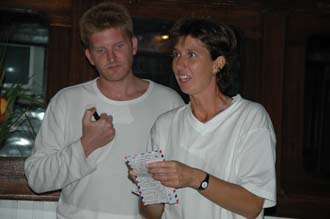 AMI Lombok Ombak Putih sailing ship captains dinner tour leader Caroline translating Martins poem to Bahasa Indonesia 3008x2000