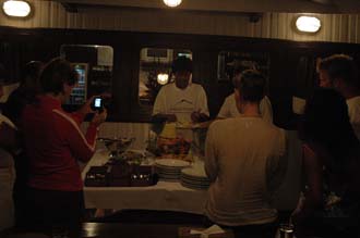 AMI Lombok Ombak Putih sailing ship open air buffet for dinner on lower deck 2 3008x2000