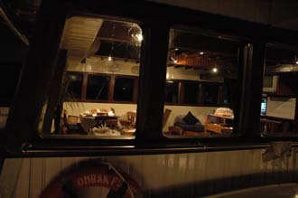 AMI Lombok Senggigi Ombak Putih dining room by night from outside 3008x2000