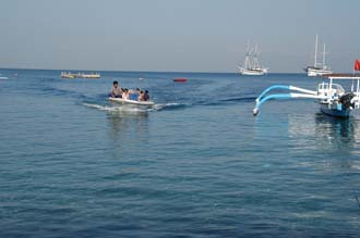 AMI Lombok Senggigi Ombak Putih sailing ship panorama from Senggigi beach with outrigger boat and dinghy 3008x2000
